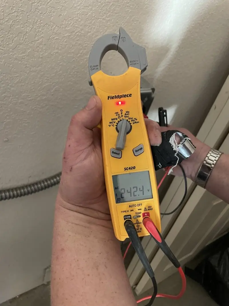 Voltage testing with clamp meter during Aluminum Wiring Replacement in Carpentersville